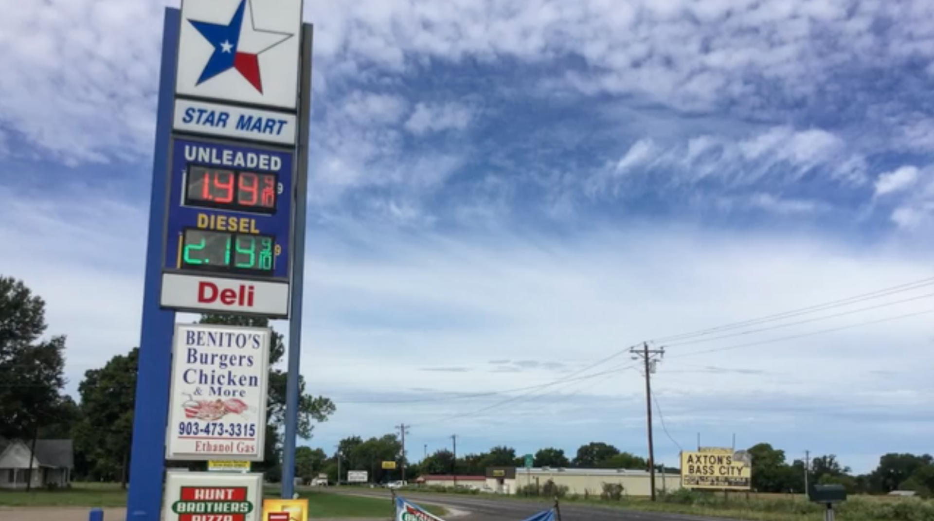 Exterior sign for�Frank Hemani�s convenience store on the side of the road,�Photo Credit: The Sun News