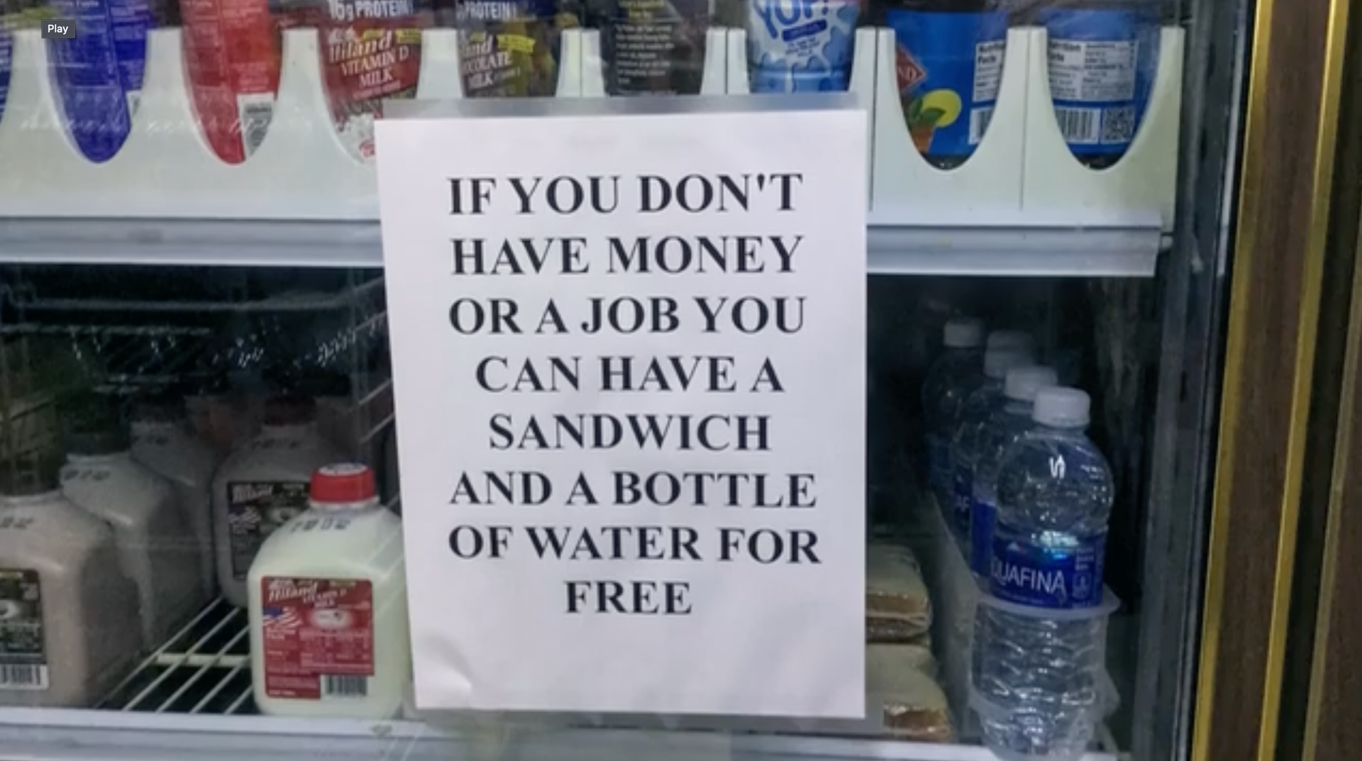 Frank Hemani�s note to the less fortunate taped to the exterior glass of a beverage refrigerator,�Photo Credit: The Sun News