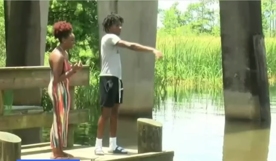 Corion Evans with one of the girls he rescued, Photo Credit: MS Now/Youtube