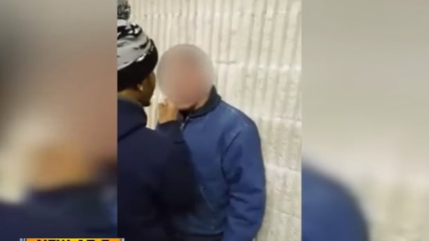 a mentally disabled man being slapped