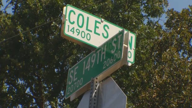 Street signs, intersection of SE 149th St. and Coles Ln.