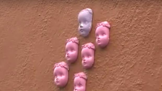 Weird Baby Doll Faces Appear In Denver (Video) Promo Image