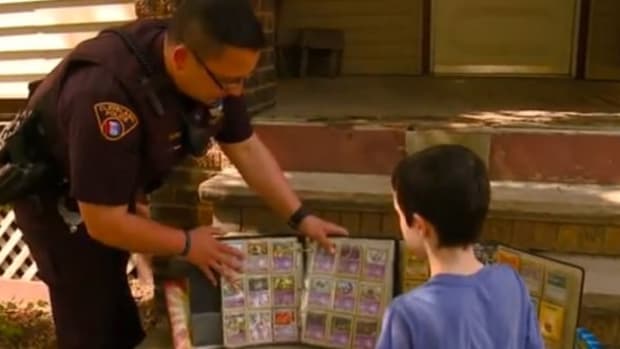 Officer Gives Boy His Pokemon Card Collection (Video) Promo Image