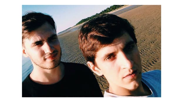 Russian Cops Arrest Gay Couple For Orlando Sympathy Note Promo Image