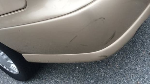 Man's Reaction To Car Damage Goes Viral (Photos) Promo Image