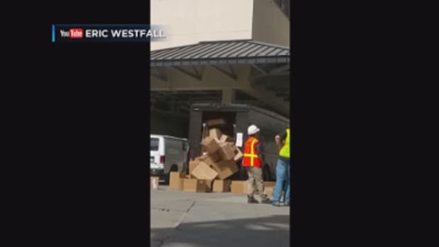 UPS Employee Damaging Packages.