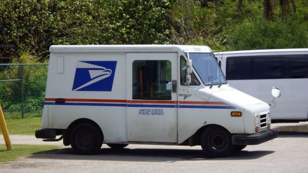 USPS Carrier Asks Residents To 'Ship All You Can' Promo Image