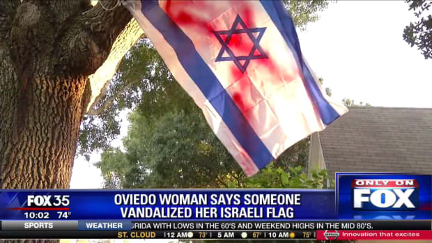 Florida family's Israel flag after it was vandalized 