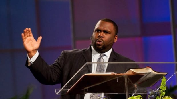 Pastor Sues After Being Fired For Anti-LGBT Sermons Promo Image