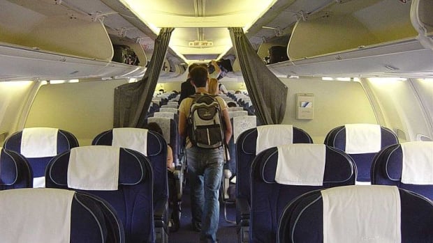 Woman Sues Airline After Being Forced To Move Seats Promo Image