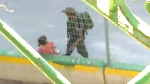 Border Guards Take Girl's Bike, Toss Into Bushes (Video) Promo Image
