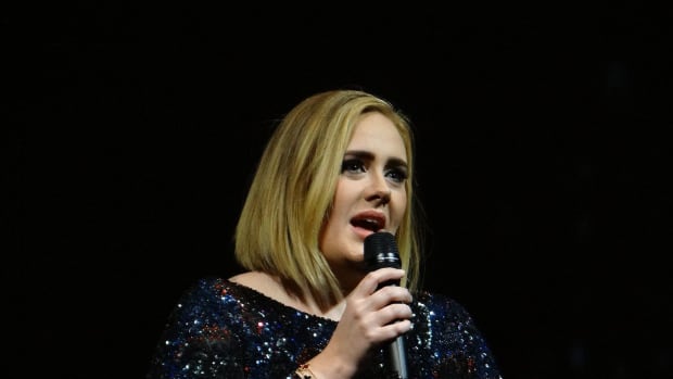 Adele Breaks Grammy In Half To Share With Beyonce (Video) Promo Image