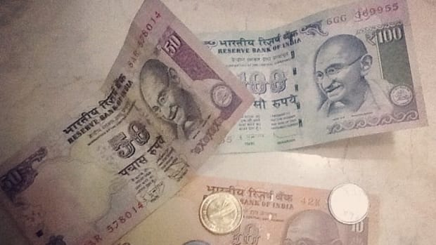 India Discontinues Rupee Notes In Anti-Corruption Move Promo Image