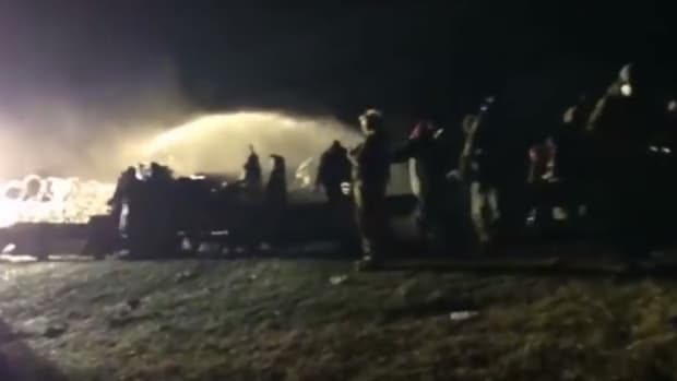 Police Spray Water On DAPL Protesters In Freezing Temps (Video) Promo Image