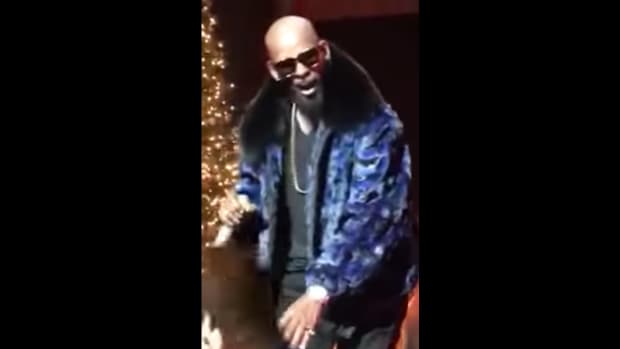 Fan Grabs R. Kelly's Privates As He Sings On Stage (Video) Promo Image