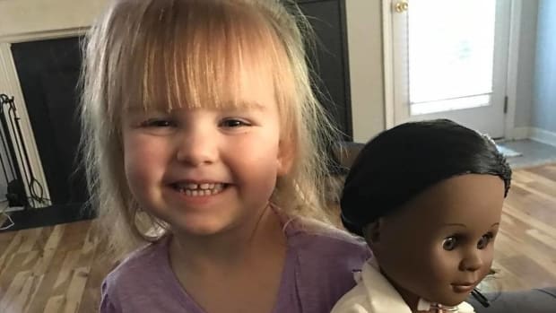 Girl's Response To Cashier Over Black Doll Goes Viral (Photo) Promo Image