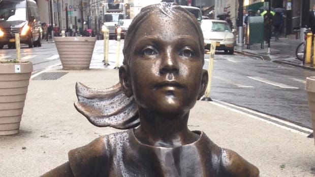 'Fearless Girl' Statue Dressed To Look Like Trump Fan (Photo) Promo Image