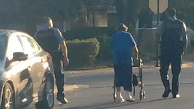 Chicago Officers Escort Lost Elderly Woman Home (Photo) Promo Image