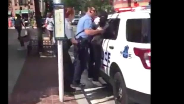 Outrage: DC Cop Dangles Black Woman Off Ground (Video) Promo Image