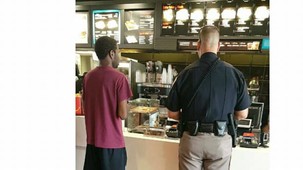 Cop Pays For Black Teen's Food (Photo) Promo Image