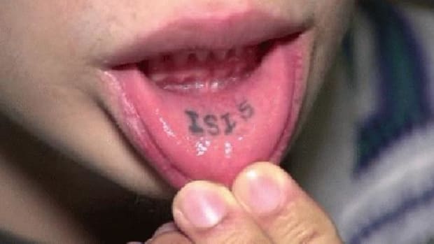 Here's The Shocking Tattoo That Got This Home Depot Employee Fired; Did He Deserve It? (Photo) Promo Image