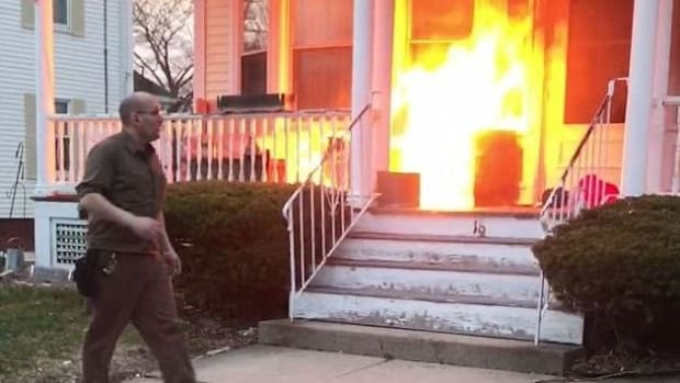 UPS Driver Saves Family From House Fire (Video) Promo Image
