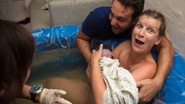 Photo Captures Moment Couple Learn Newborn's Sex (Photos) Promo Image