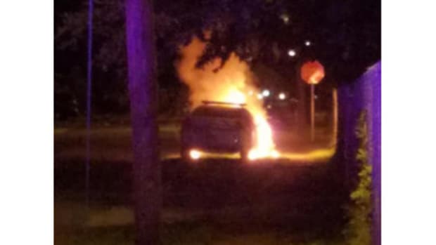 Police Car Firebombed Outside Florida Mosque  Promo Image
