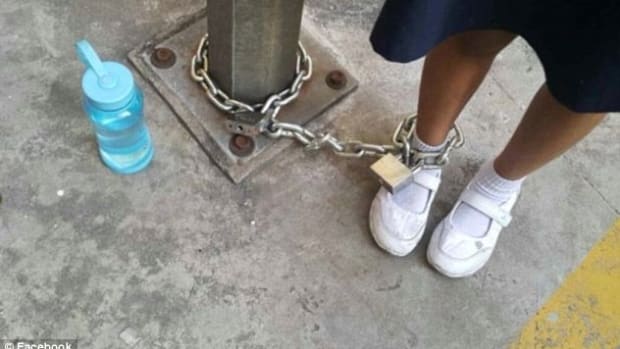 Woman Chains 8-Year-Old Daughter To Playground Pole (Photos) Promo Image