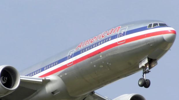 American Airlines Employee Tells Passenger: 'Hit Me!' (Video) Promo Image