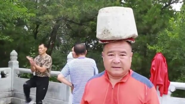 Man Loses 66 Pounds, Walks With Cement On Head (Video) Promo Image