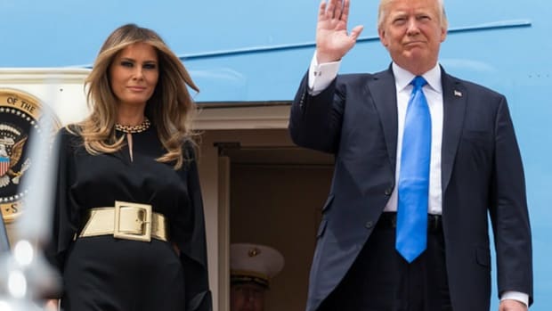 Melania's Middle East Wardrobe May Have Hidden Message Promo Image