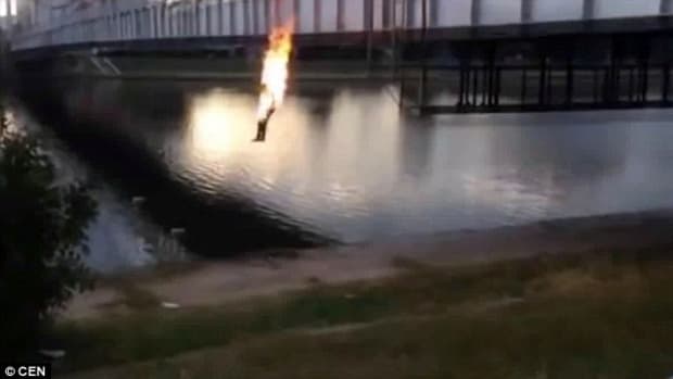 Teens Set Themselves Ablaze And Jump Off Bridge (Video) Promo Image