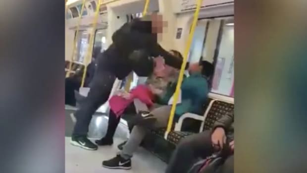 White Man Punches Asian Man On Subway (Video) Promo Image