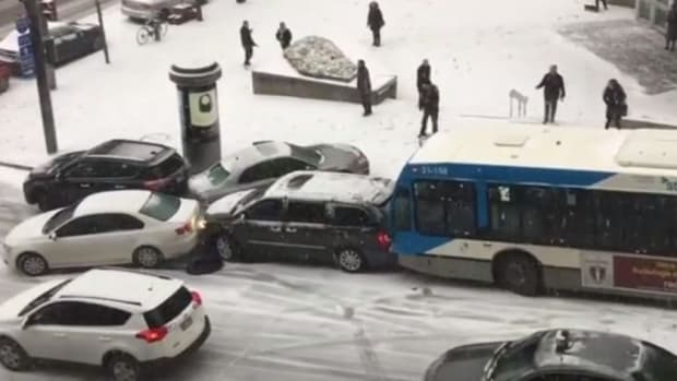 Buses, Cars, Police Crash On Icy Road (Video) Promo Image