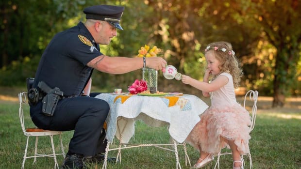 Toddler Has Tea Party With Officer Who Saved Her Life Promo Image