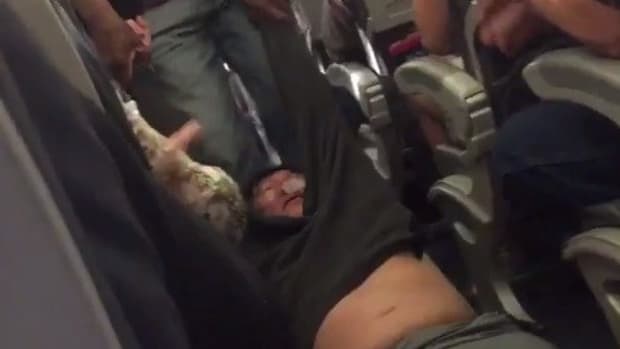 Doctor Dragged Off United Flight Has Criminal History Promo Image