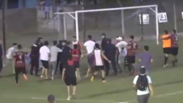 Soccer Fans Attack Referees On Field (Video) Promo Image