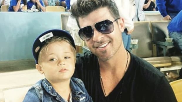 Robin Thicke's Ex-Wife Accuses Him Of Child Abuse Promo Image
