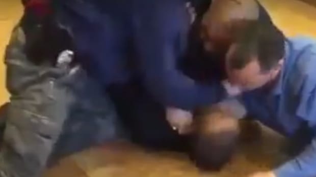 NYPD Officer Repeatedly Punches Subdued Man (Video) Promo Image