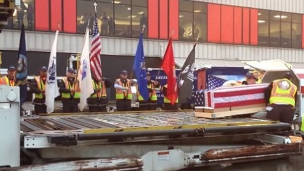 Airport Staff Honors Fallen Soldier And His Dog (Video) Promo Image