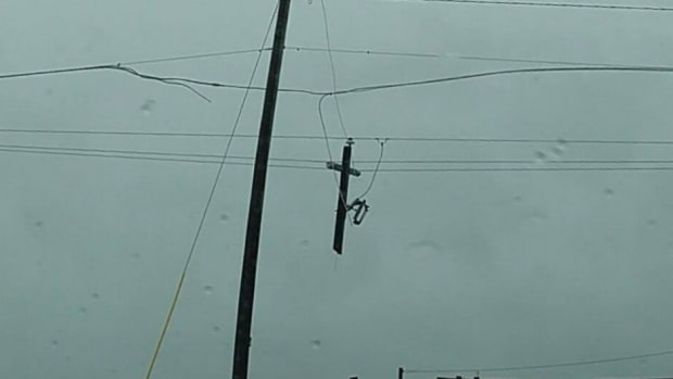 Deadly Storms Leave Christian 'Cross' In Power Lines? Promo Image
