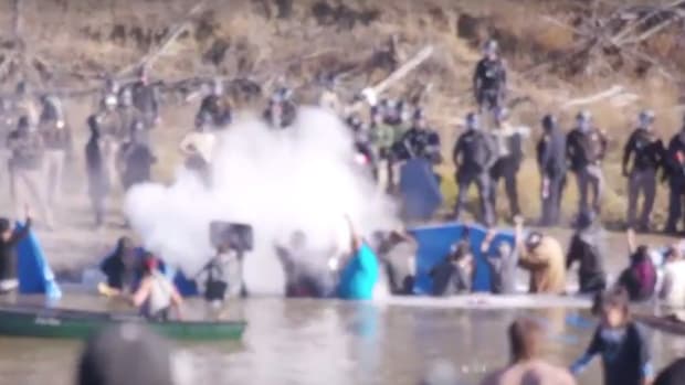 Cops Use Rubber Bullets, Pepper Spray On Native Americans (Video) Promo Image