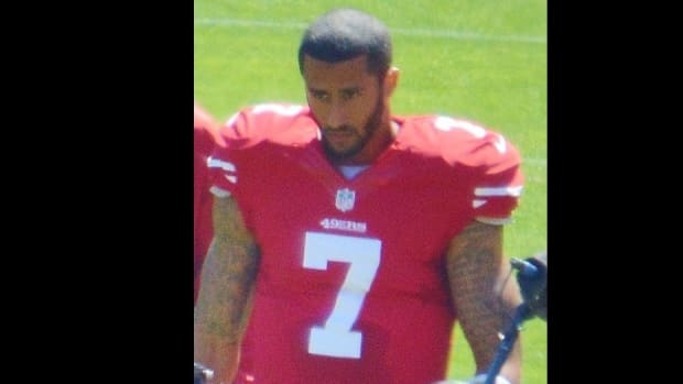 Will Colin Kaepernick Remove The Flag From His Helmet? Promo Image