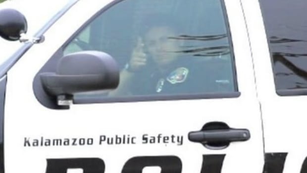 Officer Under Fire For Hand Gesture (Photo) Promo Image