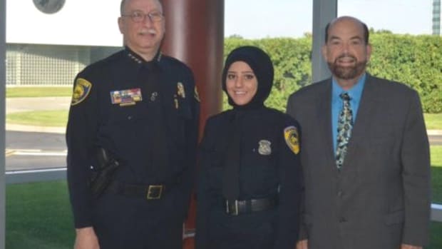 Police Department Hires First Officer To Wear Hijab Promo Image