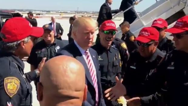 Police Officers Disciplined For Wearing Pro-Trump Hats Promo Image