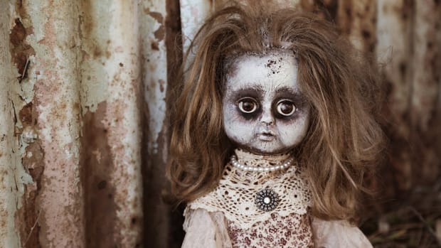 Camera Catches A 'Possessed' Doll Moving Head On Its Own (Video) Promo Image