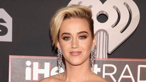 Katy Perry Sparks Controversy By Wearing Galliano Gown (Photo) Promo Image