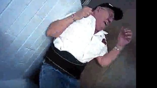 Did This Cop Break An Elderly Man's Ribs At Wal-Mart? (Video) Promo Image